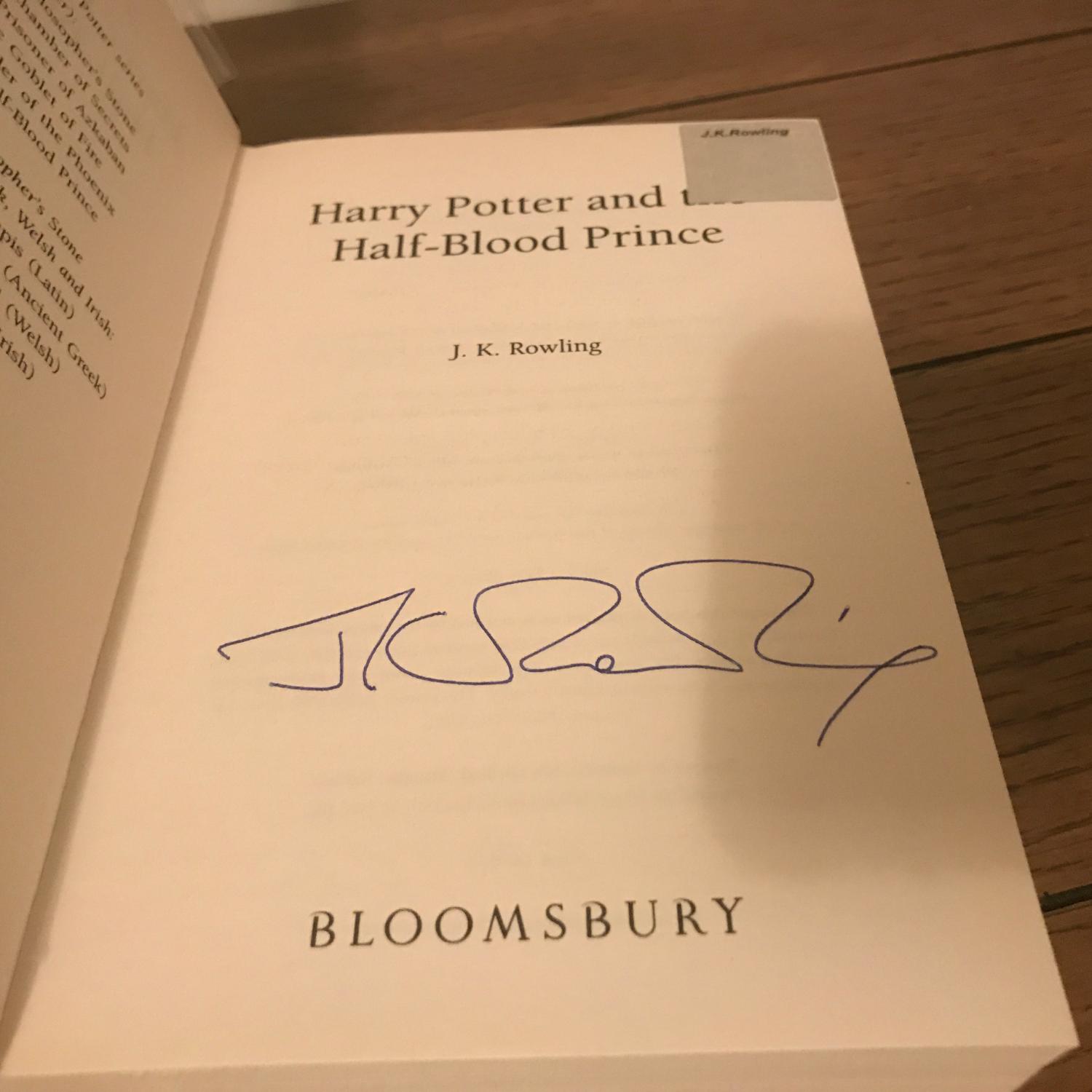 J.K. Rowling Signature Forgery with what looks to be an authentic Rowling hologram that was pulled from an authentically signed, lesser valued book (like Casual Vacancy). Found inside an adult edition Half-Blood Prince on Abebooks. Sold by CWO Books.