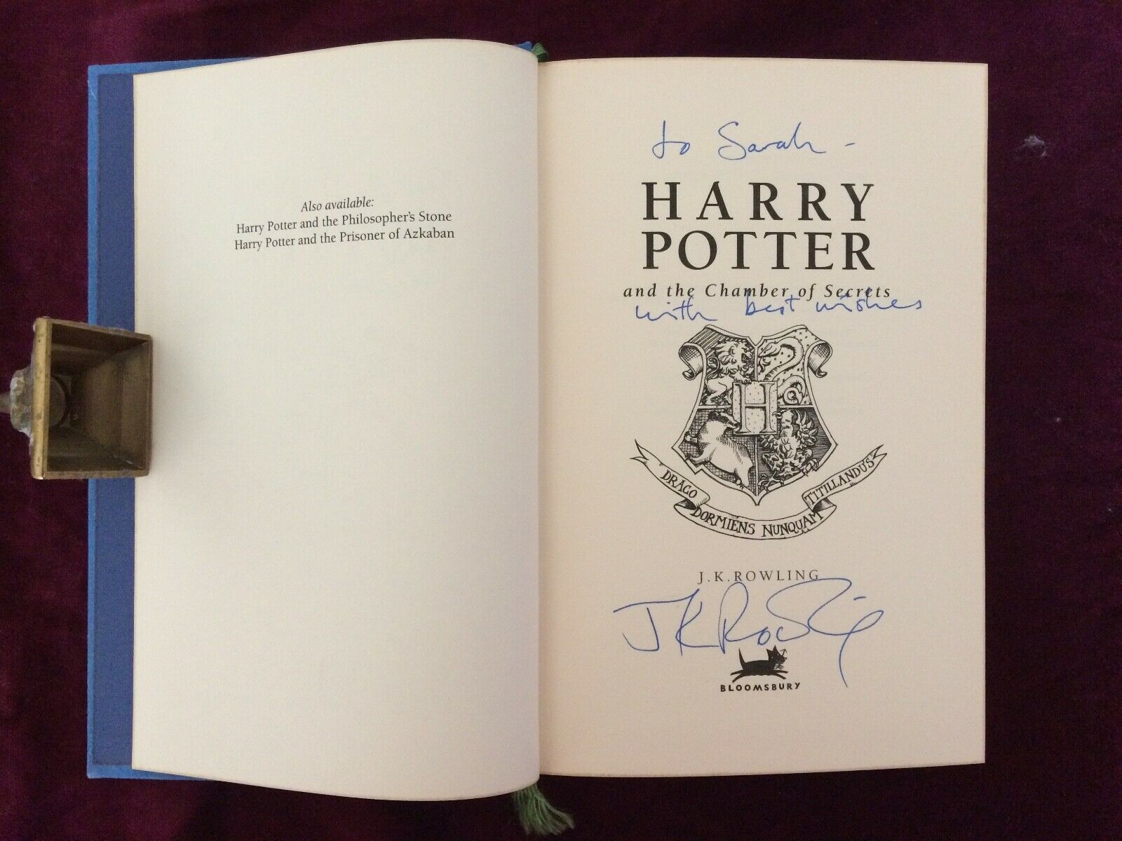 J.K. Rowling signature forgery found inside a Bloomsbury Deluxe edition of Harry Potter and the Chamber of Secrets on eBay. Sold by mColes78.