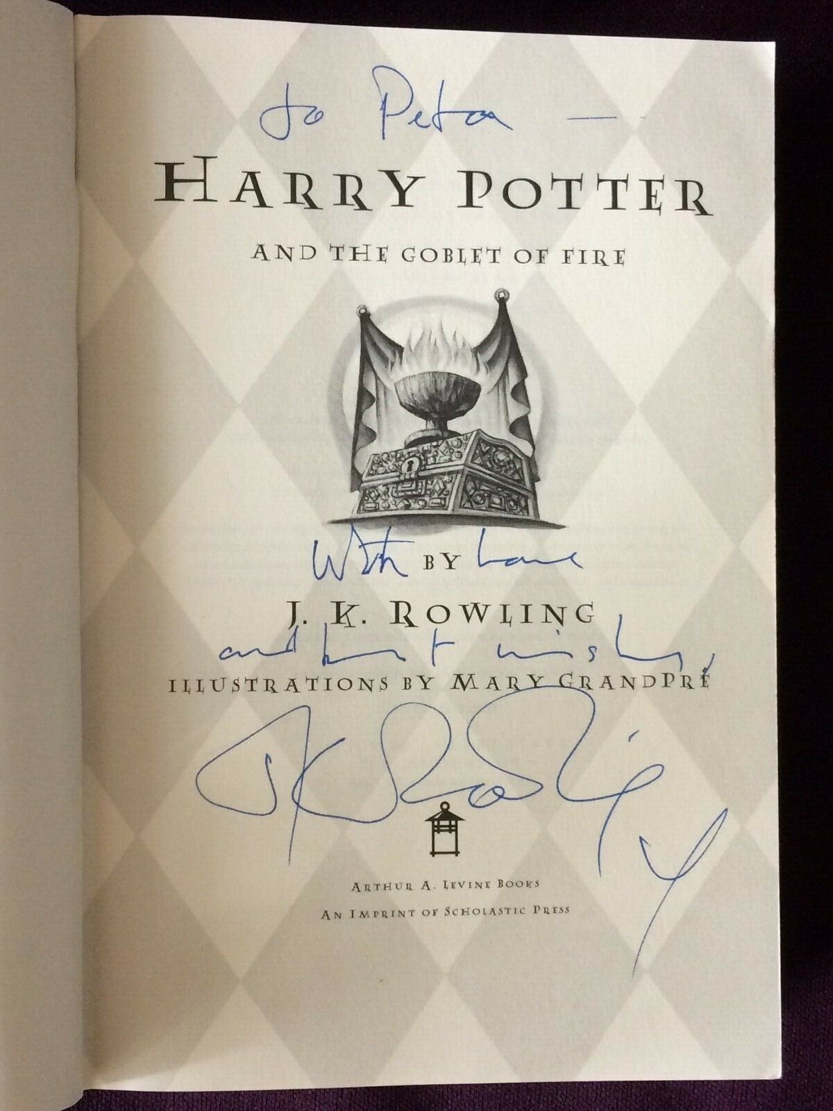 J. K. Rowling signature forgery inside a US Harry Potter and the Goblet of Fire on eBay. Sold by beatjup0.