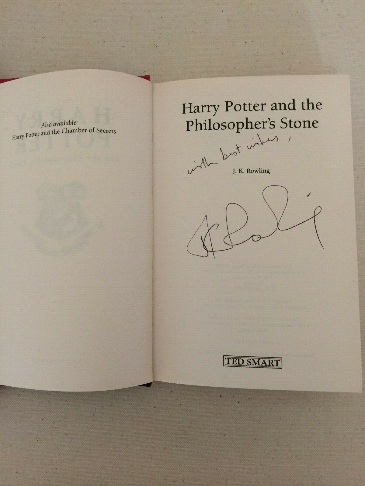 J.K. Rowling signature forgery found on ebay inside a Harry Potter and the Philosopher's Stone. Sold by beatjup0.