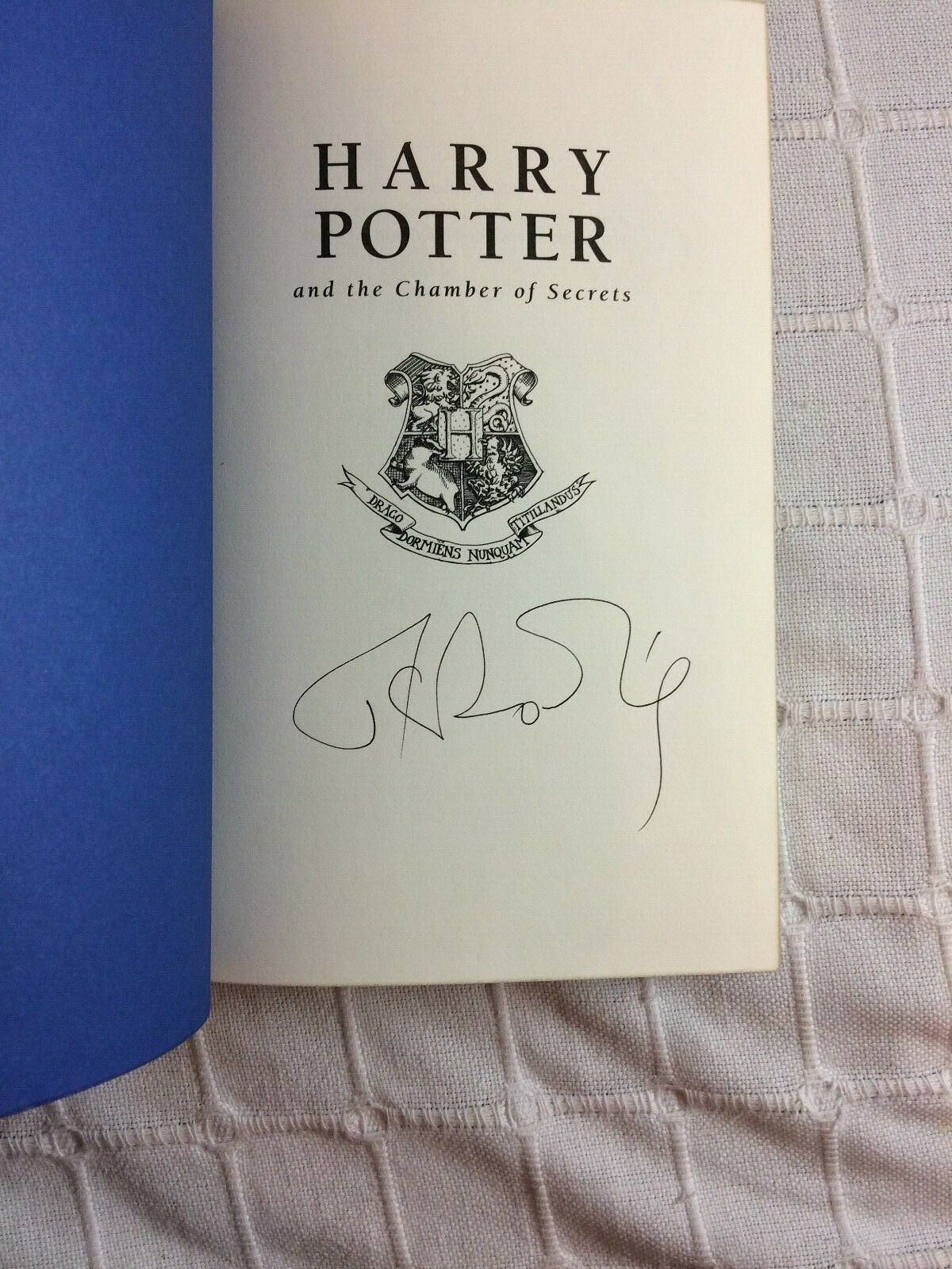 JK Rowling signature forgery inside a UK Deluxe edition Harry Potter and the Chamber of Secrets on ebay. Sold by PlantCollections72