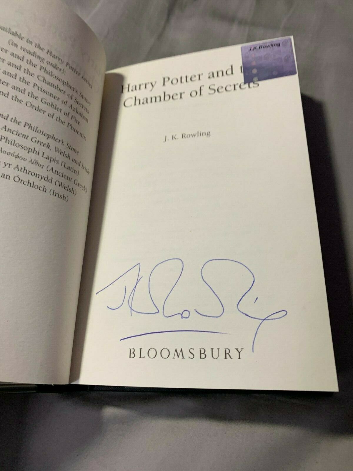 JK Rowling Signature Forgery with authentic hologram; found on eBay inside a Harry Potter and the Chamber of Secrets; fake JK Rowling Autograph.